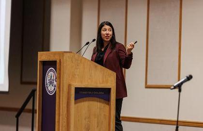 Jillian Peterson speaking at Symposium Against Indifference